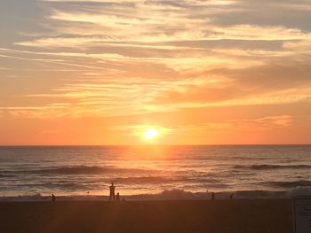 Scenic view of sunset over sea