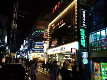 Crowd in city at night