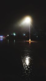 Illuminated street lights at night