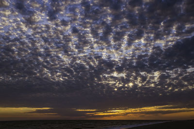 Scenic view of sea against dramatic sky