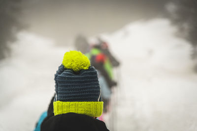 Close-up of baby boy with snow