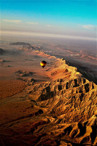 Aerial view of hot air balloon in desert