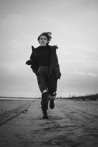 Portrait of teenage girl on beach