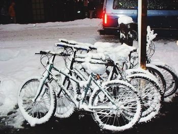 Cars parked on snow covered road