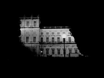 Low angle view of built structure at night