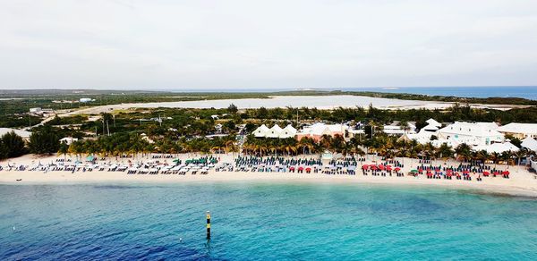 High angle view of swimming pool by sea against sky