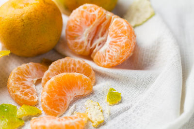 Close-up of oranges on table