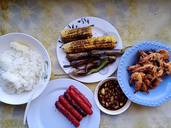 High angle view of breakfast served on table