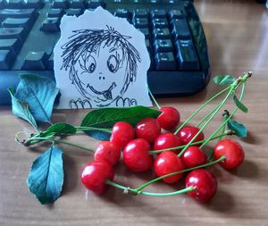 High angle view of cherries on table