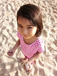 Portrait of girl standing at beach