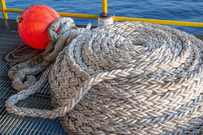 Rope on boat moored at harbor