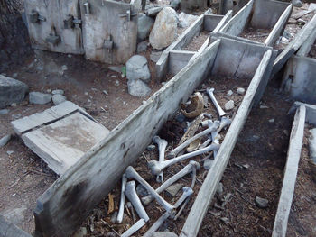 High angle view of old rusty wheel