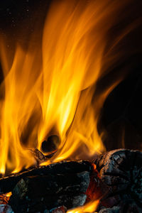 Red, orange and yellow flames from firewood in a oven