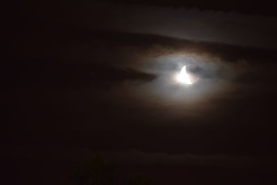 Low angle view of moon in sky at night