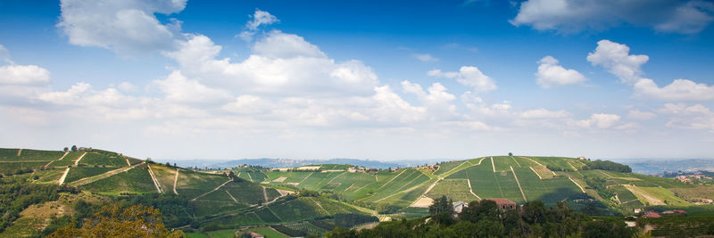 Panoramic view of agricultural landscape against sky