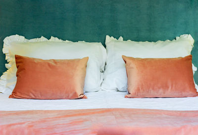 Close-up of sofa on table against wall