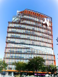 Low angle view of modern building against clear sky