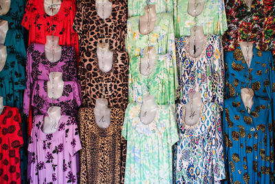 Full frame shot of multi colored dresses for sale in market