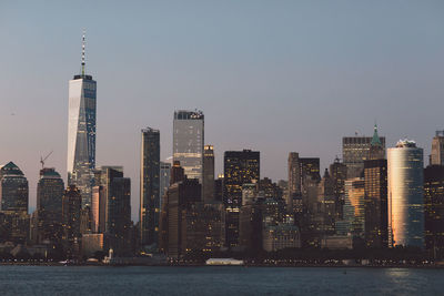 Skyscrapers lit up at waterfront