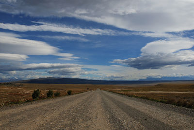 Road amidst landscape against sky