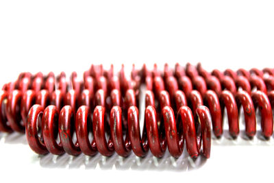 Close-up of cake against white background