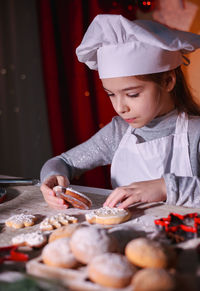 Midsection of woman preparing food