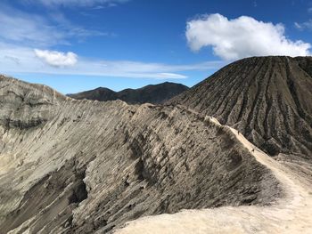 Panoramic view of volcanic landscape against sky