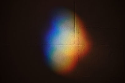 Colorful illuminated lights on wall