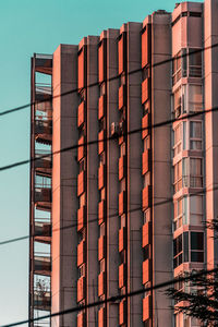 Low angle view of modern buildings against clear sky