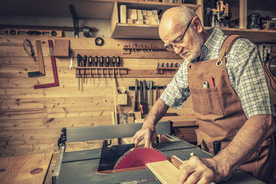 Man working on wood