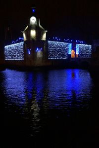View of illuminated city at night