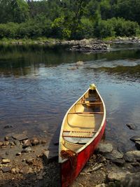 Boat moored on lake