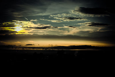 Scenic view of dramatic sky during sunset