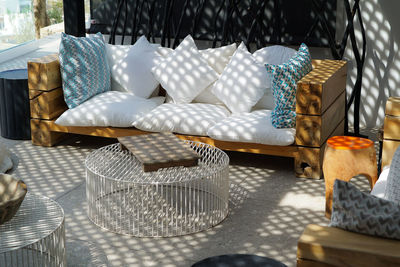 Close-up of empty chairs and table