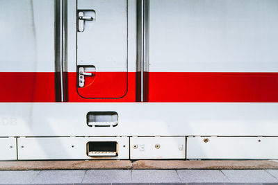 Close-up of white and red train