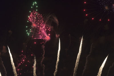 Firework display at night