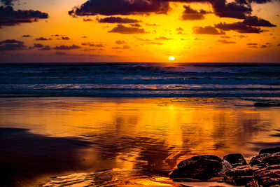 Scenic view of sea against sky during sunset