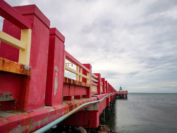 View of train on sea against sky