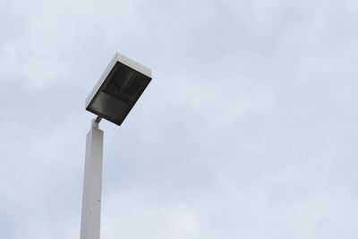 Low angle view of street light against sky