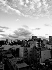 High angle view of buildings in city against sky