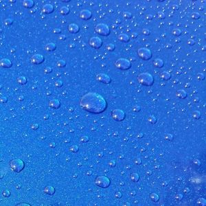 Close-up of water drops on glass