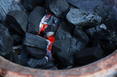 High angle view of fire on barbecue