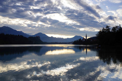 Scenic view of lake against sky during sunset