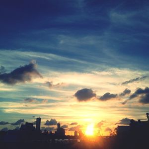 Silhouette of buildings at sunset