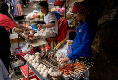 Street food vendor in ha giang. ethnic minority in vietnam.