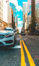 Cars on road in city