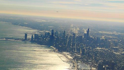 Scenic view of sea against sky at sunset