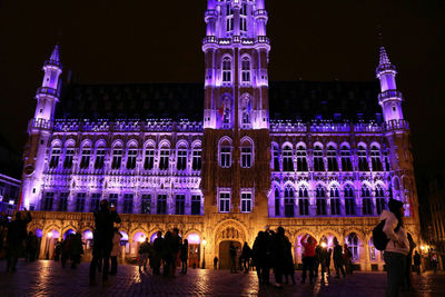 Tourists at night