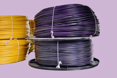 Close-up of stack of objects against white background