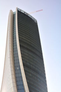 Low angle view of modern buildings against clear sky